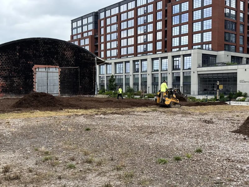 Equipment spreading donated mulch at Neuhoff Dog Park in Nashville.